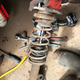 Illustration for article titled What does a Toyota Strut look like after 100,000 miles and 17 years?